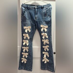 NWOT Olli & Hali Women's Blue Jeans with Cream Bow Accents